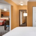 What is the Minimum Age Requirement for Staying at Suites in Denver, Colorado?